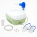 Green and white nebulizer with accessories on a white background