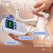 Dr. Odin fetal doppler being held by a hand with a baby's heartbeat displayed on the screen.