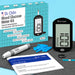 Glucose meter with test strips and lancet device on a wooden surface