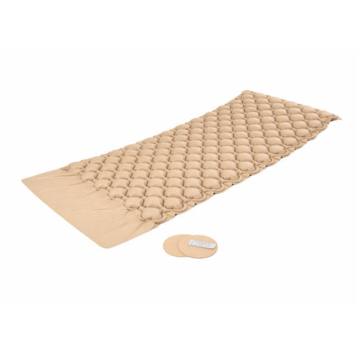 Beige quilted mat with a circular pad on a white background