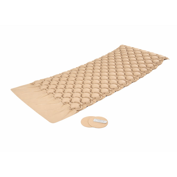 Beige quilted mat with a circular pad on a white background