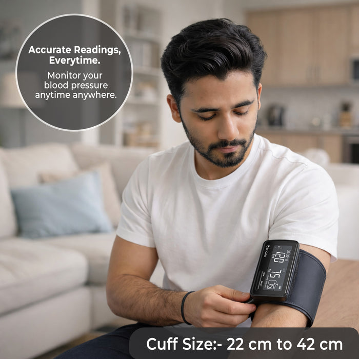 Man using a blood pressure monitor in a living room setting