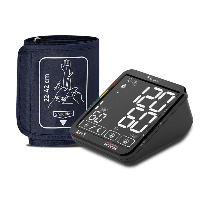 Blood pressure monitor with digital display and wrist cuff on a white background