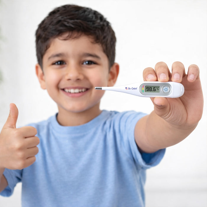 Child holding a digital thermometer with a white background