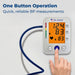 Dr. Odin blood pressure monitor with digital display and hand pressing a button on a light gray background.