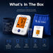 Dr. Odin blood pressure monitor set with arm cuff, batteries, and user manual on a dark background.